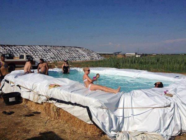 Cool Country Swimming Pool from Bales of Hay