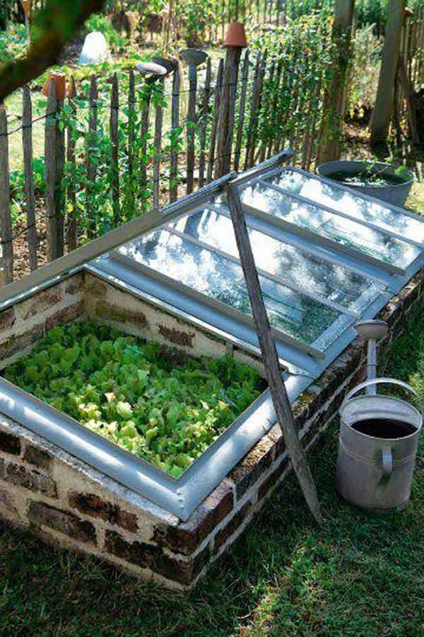 04-mini-greenhouse-made-from-recycled-bricks-and-windows