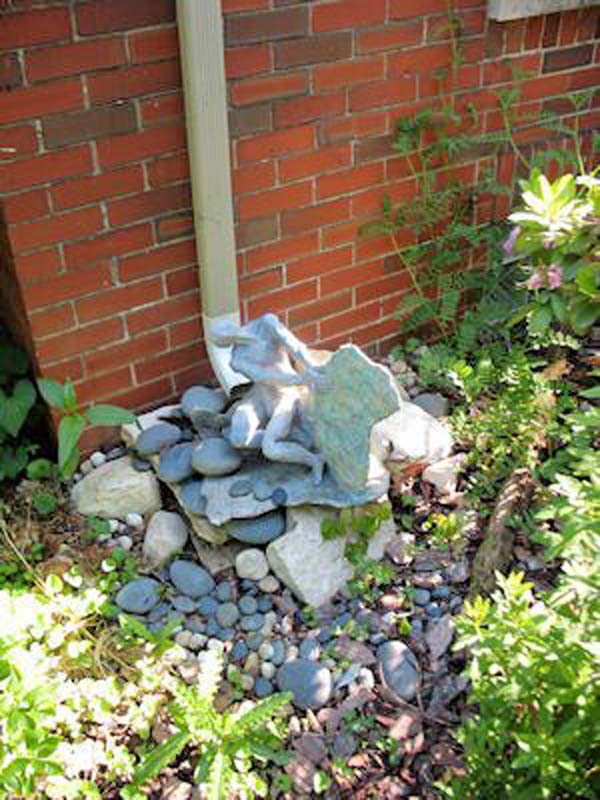 The Best 20 DIY Ideas to Create a Decorative Downspout Landscape