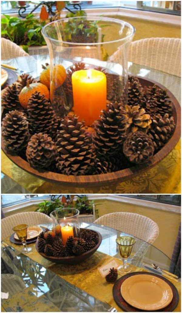 5. Pinecone Centerpiece Made With Wooden Bowl, Candle and Some Pinecones