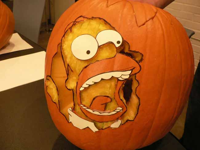 D'oh! A very detailed carving of Homer Simpson's head looks like it's bursting right through the side of this pumpkin.
