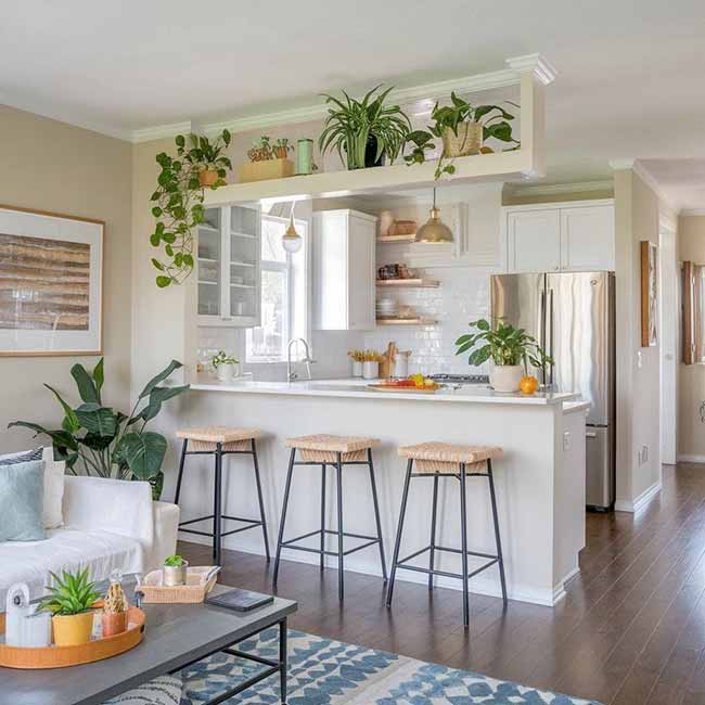 Why squeeze in a separate table if the counter can do double duty? Extend your kitchen island or add a small overhang, then pull up a few stools. It saves tons of space and keeps the vibe casual, whether you’re having breakfast or chatting with friends while cooking.