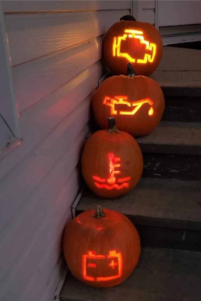 For a fun idea, this person carved car dashboard warning lights into four pumpkins. They're arranged on a set of stairs.